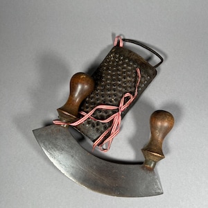 Chopping knife and grater shabby chic country house decoration antique old kitchen