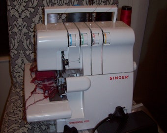 Overlock Singer 14SH654 sewing machine 3/4 thread, differential