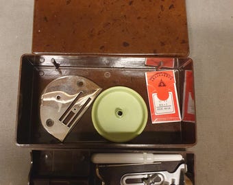 Vintage Veritas sewing machine accessories, box
