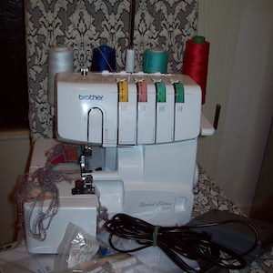 Brother 1034D overlock sewing machine, 3/4 thread, differential feed image 1