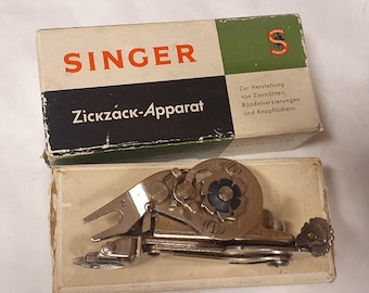 Zigzag sewing machine Singer 221, 222, 201, 66 or 99.