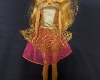 Vintage Mattel Barbie blonde with braided hairstyle in gold & pink glitter outfit