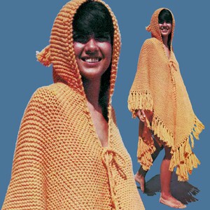Puede incluir: Un poncho de ganchillo con capucha y flecos en color naranja brillante. El poncho se ata al cuello con una borla larga.