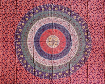 May include: A tapestry with a large, circular mandala design in shades of blue, purple, red, and yellow. The mandala is surrounded by a smaller floral pattern in shades of red and purple.