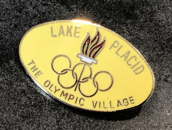 Pin Badge 1980 LAKE PLACID The Olympic Village Ye… - image 1