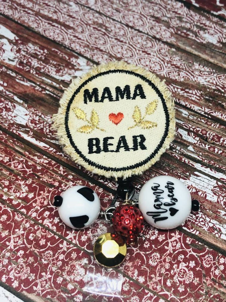 Mama bear badge reel