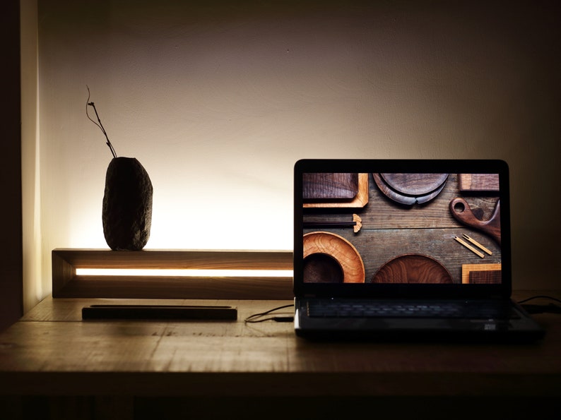 [Harmony] is a minimalist wood wall light, a linear wall lamp handmade of walnut wood, as wall art, home decor, bedroom decor. Also a perfect gift for him and gift for her.