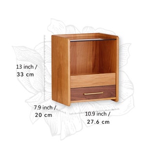 [Island] is a cosmetic & makeup organizer made of American cherry wood and walnut wood, with large capacity for dozens of cosmetics.