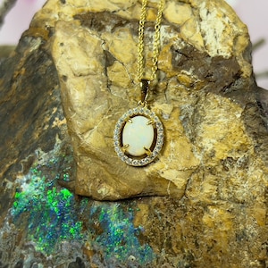 Gold plated Sterling Silver 9x7mm Natural White Opal halo pendant