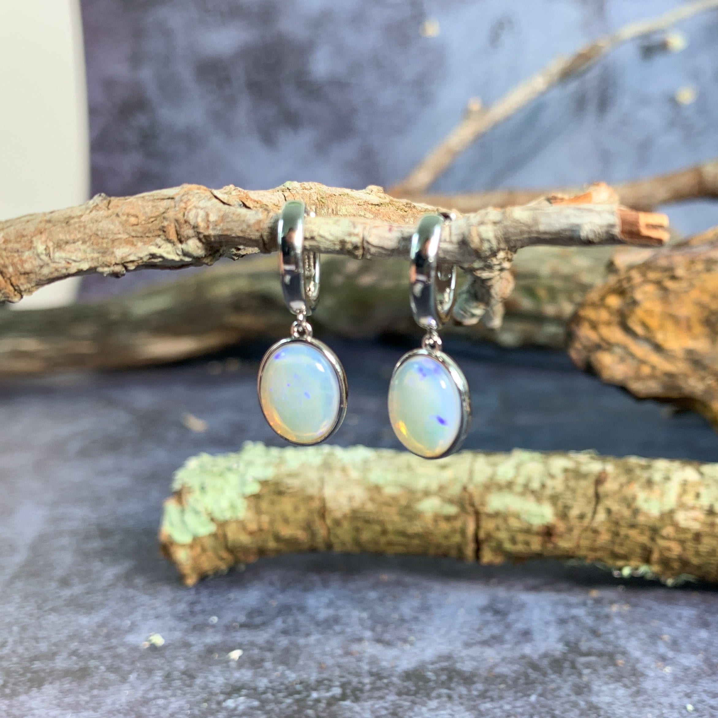 Sterling Silver dangling White Opal 10x8mm pair of Huggies