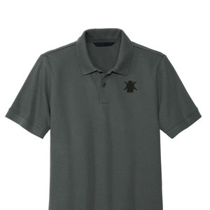 May include: A dark gray short-sleeved polo shirt with a black embroidered logo on the left chest. The logo is a stylized star with a circle inside.
