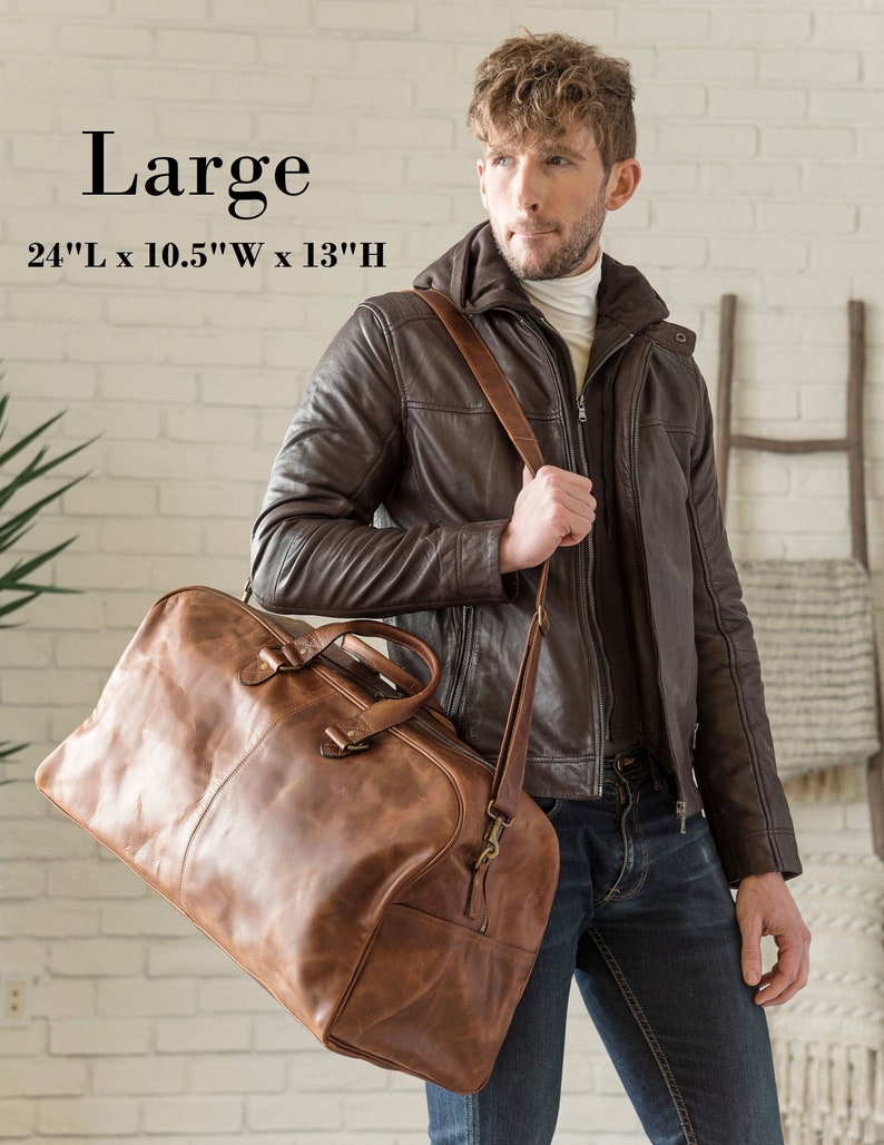 May include: A large brown leather duffel bag with a shoulder strap. The bag measures 24 inches long by 10.5 inches wide by 13 inches high.