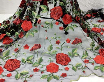 May include: Black mesh fabric with red and green embroidered roses.