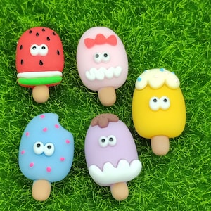 Ojo de dibujos animados de 27mm, paleta de helado, artesanía de resina, cabujón con reverso plano, adorno de comida falsa Kawaii para accesorios de colección de recortes