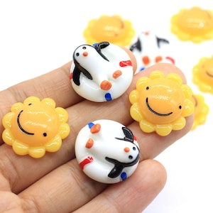 Linda cara sonriente Sol Encantador acuario Pingüino Flatback Resina Cabujones para el cabello Moños Slime Charms