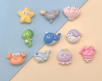 Cabujones de resina para uñas con base plana de animales marinos variados: ballena, cangrejo, caballito de mar, concha, delfín, pez