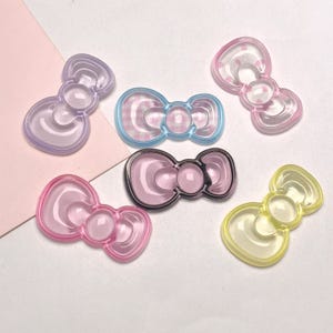 38 mm geleikleurige kawaii strikvormige harsbedels voor accessoires DHZ