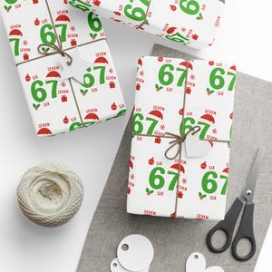 May include: Gift-wrapped presents with white paper featuring a repeating pattern of the number 67 in green, Santa hats, snowflakes, and the word "SIX" and "SEVEN". Tied with twine and a blank tag. Includes scissors and a ball of twine.