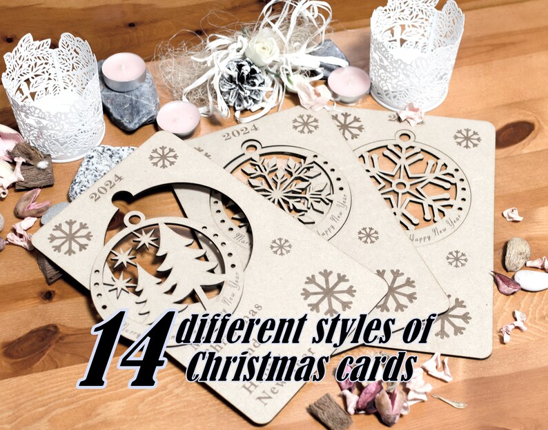 May include: 14 different styles of Christmas cards featuring a variety of designs including snowflakes, ornaments, and trees. The cards are made of brown cardboard and have a rustic look.