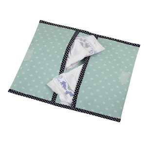 Carpeta de pañales azul claro con destellos blancos