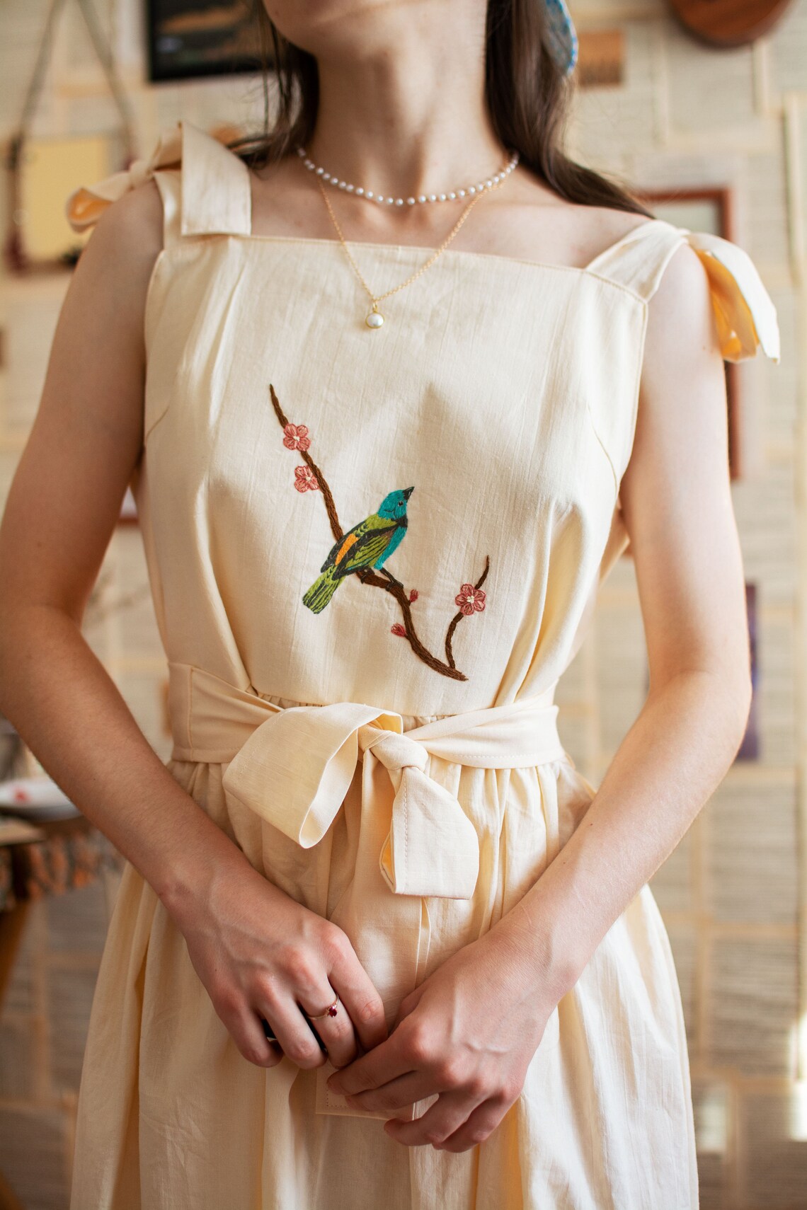beige pinafore dress