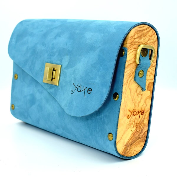 Blue leather crossbody clutch bag from olive wood use it as an evening clutch