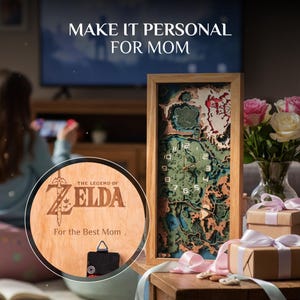 May include: A wooden clock with a map design and a wooden circle with "The Legend of Zelda" and "For the Best Mom" text. The clock has a wooden frame and a green and brown map design. The text "Make it Personal for Mom" is at the top.