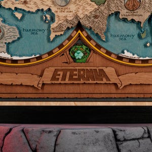 May include: A detailed wooden map with the word "Eternia" displayed. The map features landmasses in shades of brown and blue, with the text "Harmony Sea" and "Temple of the Sun". A green character is also visible.