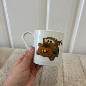 Disney Pixar Cars Movie Cup Mug Mater Finn McMissile image 1