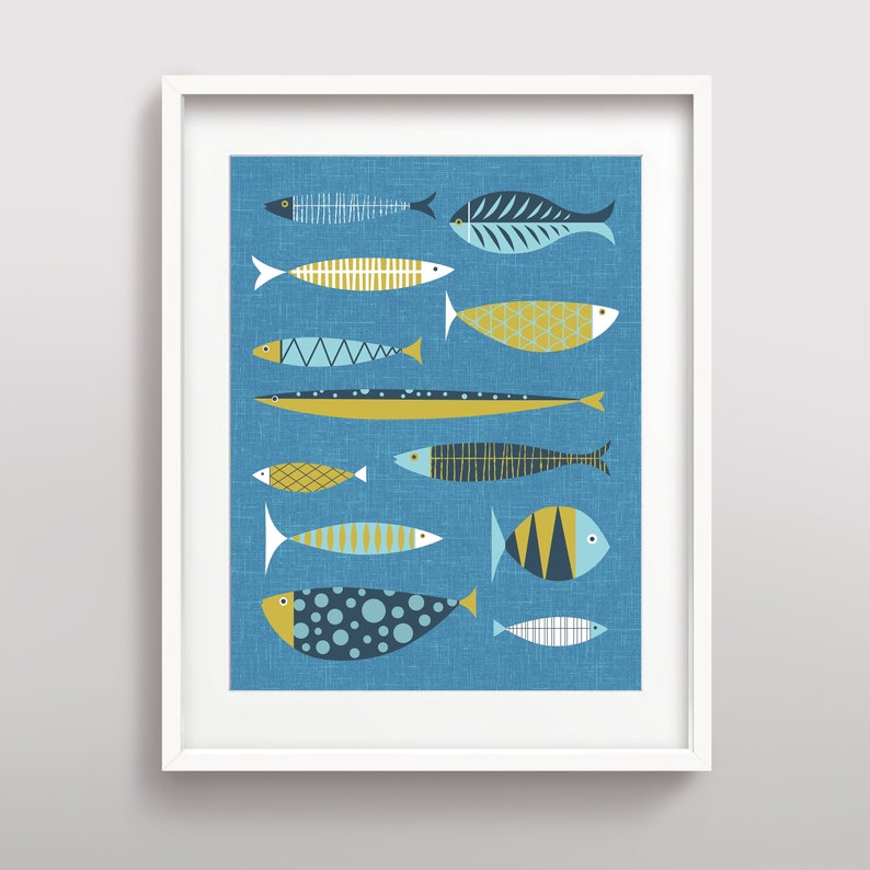 May include: A framed print of a blue background with a collection of stylized fish in various colors, including blue, yellow, and white.