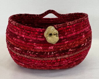 Red basket, coiled rope basket, hanging basket, storage basket,