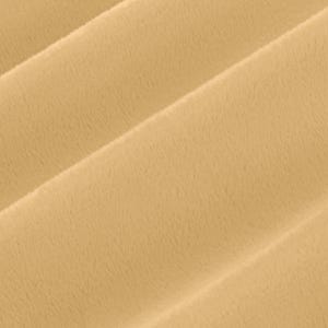 May include: A close-up of a soft, light brown fabric with a subtle texture. The fabric is folded in a way that creates diagonal lines.