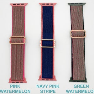 May include: Three Apple Watch bands in different colours and patterns. The band on the left is pink and brown with the text "PINK WATERMELON". The middle band is navy blue and pink with the text "NAVY PINK STRIPE". The band on the right is green and pink with the text "GREEN WATERMELON".