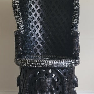 Hand-carved African Bamileke Throne Chair decorated with cowries