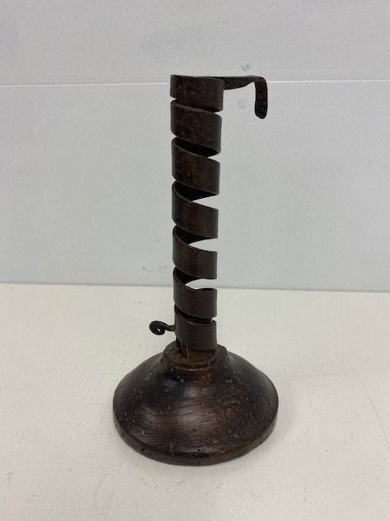 18thC iron spiral candlestick on wooden base Etsy