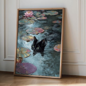 May include: A framed art print depicts a black cat swimming in a pond filled with lily pads and a pink water lily. The artwork has a vintage aesthetic, with a wooden frame and a serene, painterly style.