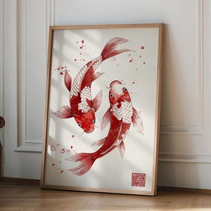 May include: A framed print of two red and white koi fish swimming in a circle against a white background with red ink splatters. The print is in a wooden frame.