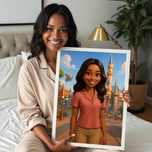 May include: A framed print featuring a cartoon illustration of a woman in a pink shirt and tan pants, set against a backdrop of a theme park with a castle and people. The print is held by a person.
