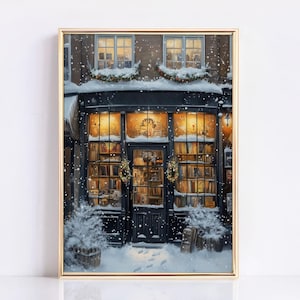 May include: A storefront with a black door and windows filled with books. The windows are decorated with wreaths and the storefront is covered in snow. The building is lit up with warm yellow lights.