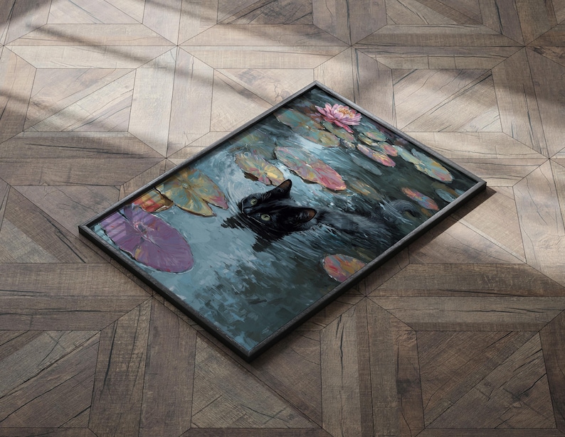 May include: Framed artwork depicting a black cat swimming in a pond with lily pads and a pink water lily. The painting has a dark, moody color palette with shades of green, blue, and purple. The frame is a dark gray color.