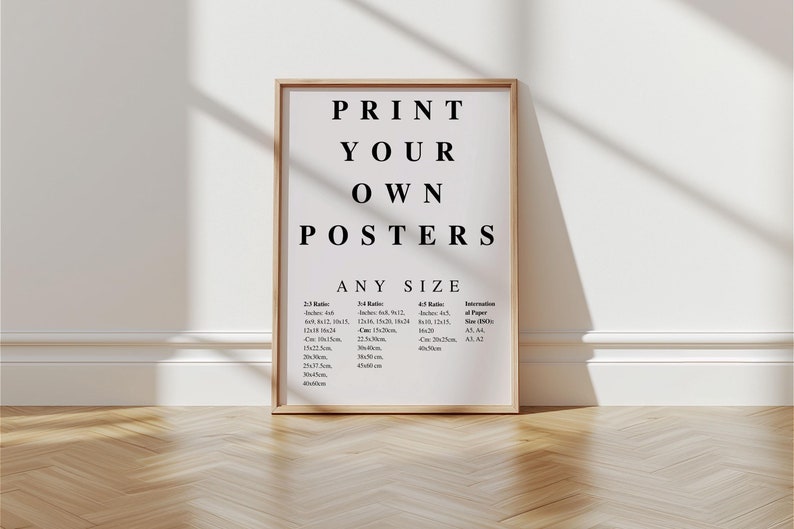 May include: A framed poster with the text "PRINT YOUR OWN POSTERS ANY SIZE" and a table listing different paper sizes in inches and centimeters.