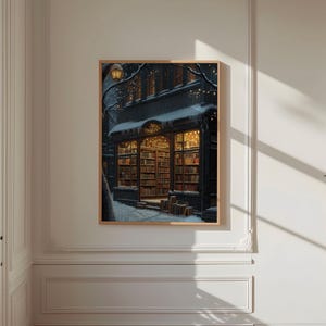 May include: A nighttime view of a bookstore with a snow-covered awning and a lit street lamp. The windows are filled with books and the door is open. The building is decorated with Christmas lights.