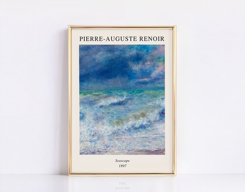 May include: A framed print of a seascape painting by Pierre-Auguste Renoir. The painting depicts a stormy sea with blue and white waves crashing against the shore. The sky is a stormy blue with white clouds. The painting is titled "Seascape" and dated 1897.