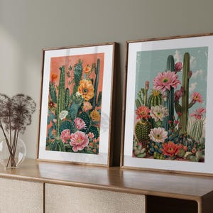 May include: Two framed botanical prints featuring colorful cactus flowers in a vintage style. The prints are in wooden frames and have a light background.
