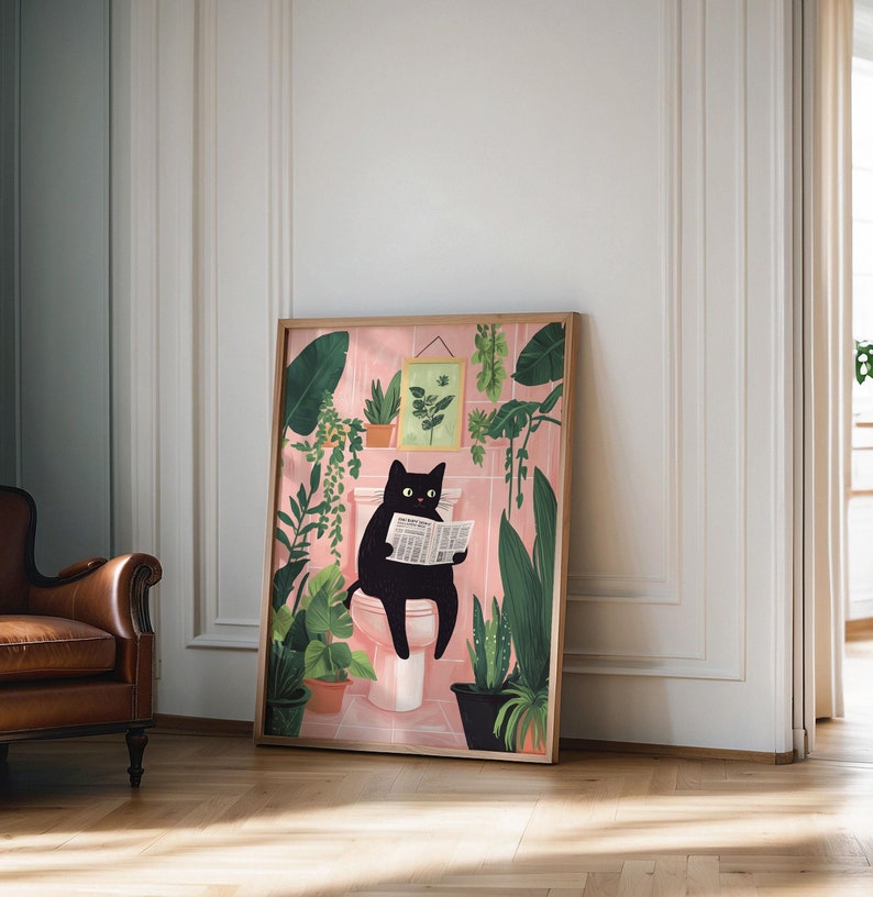 May include: A black cat sits on a toilet reading a newspaper in a bathroom with pink walls and green plants.