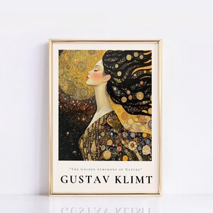 May include: A framed print of a painting by Gustav Klimt. The painting features a woman with long, flowing black hair and a golden dress. The background is a dark blue with gold stars. The title of the painting is "The Golden Symphony of Nature".