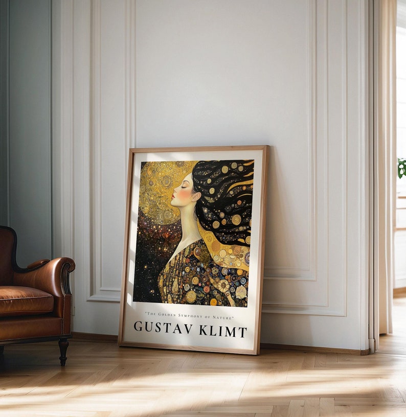 May include: A poster featuring a woman with long flowing black hair, adorned with gold and black circular patterns. The background is a dark blue with gold and black stars. The text "THE GOLDEN SYMPHONY OF NATURE" and "GUSTAV KLIMT" are at the bottom of the poster.