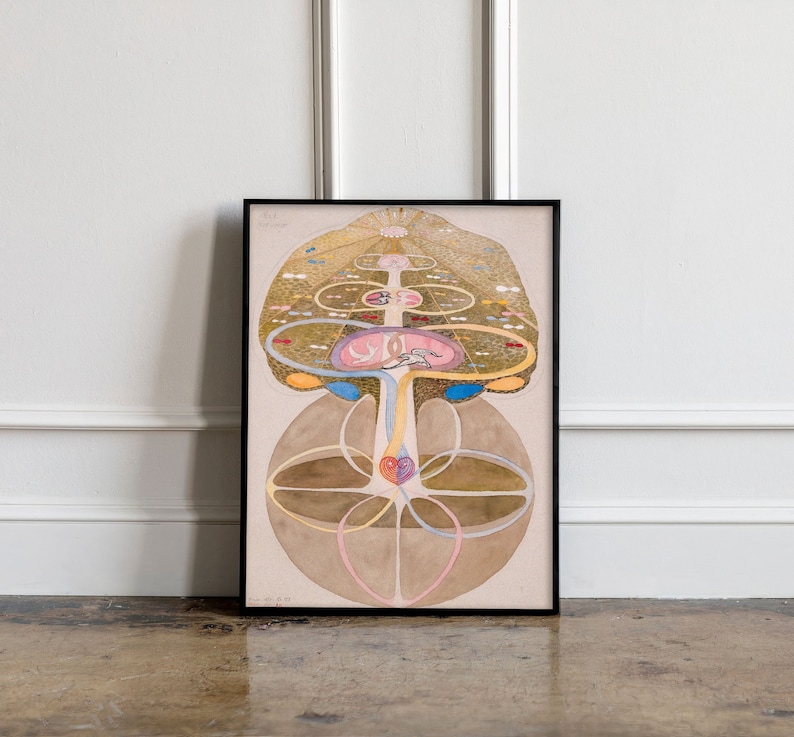 May include: A framed print of a colorful abstract painting depicting a tree with a complex network of branches and roots. The tree is surrounded by a circular pattern of overlapping circles and lines, creating a sense of interconnectedness. The painting is done in a watercolor style, with soft, muted colors.
