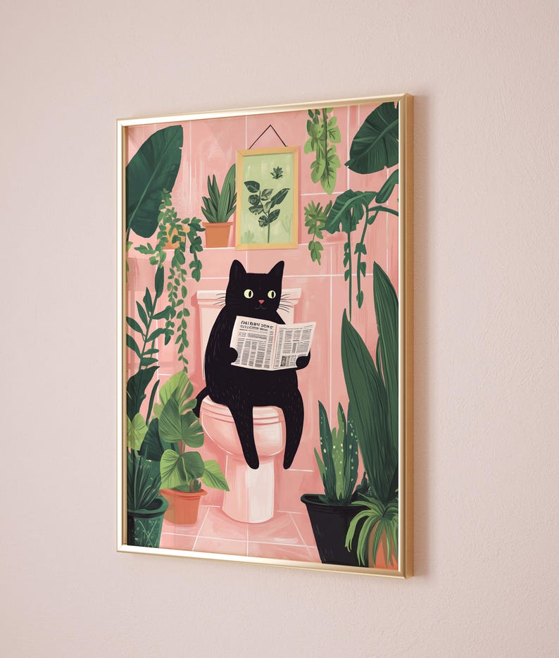 May include: A black cat sits on a pink toilet reading a newspaper in a bathroom with pink tile and many green plants.
