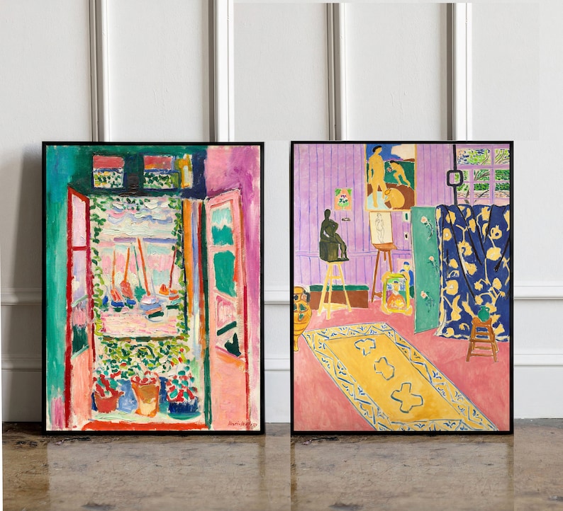May include: Two framed paintings, one depicting a colorful interior scene with a window overlooking a harbor, the other showing a purple room with a rug and a sculpture on a stand.